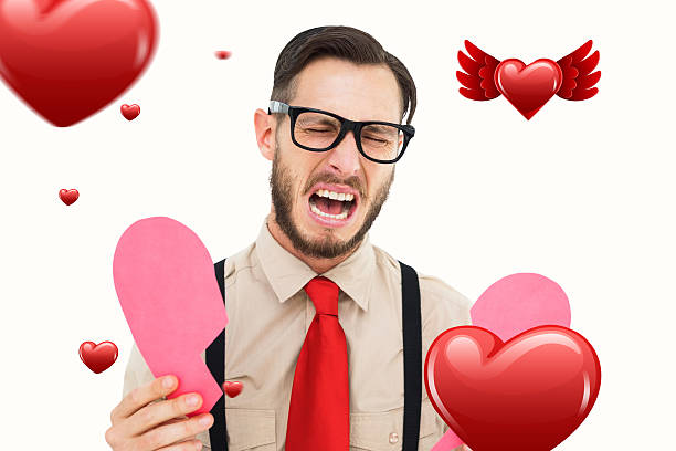 istock Composite image geeky hipster crying and holding broken heart card 531347329