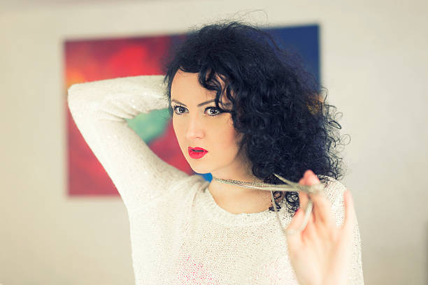 istock Beautiful young woman posing indoors 531351229