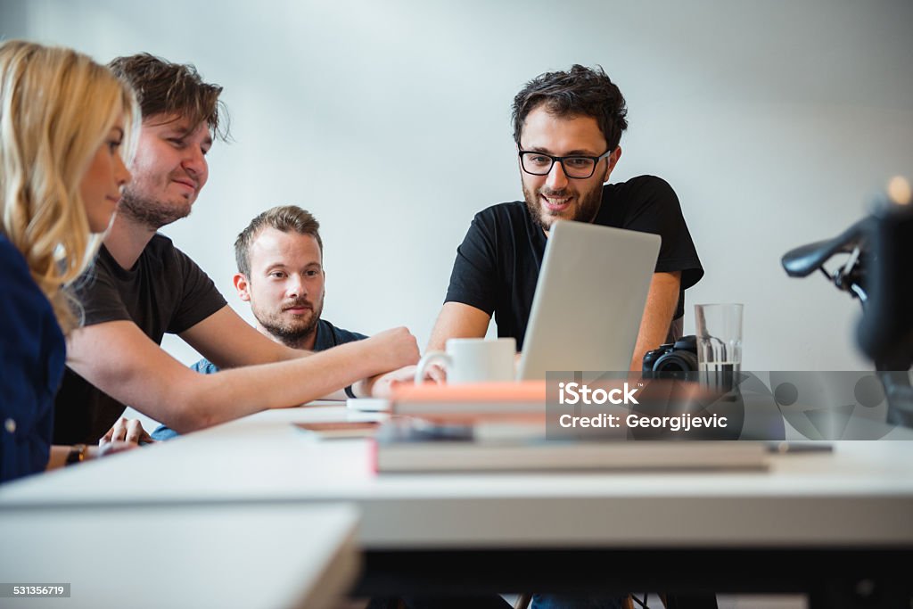 Start-up Team Team of young casual dressed people have a meeting in office. 2015 Stock Photo