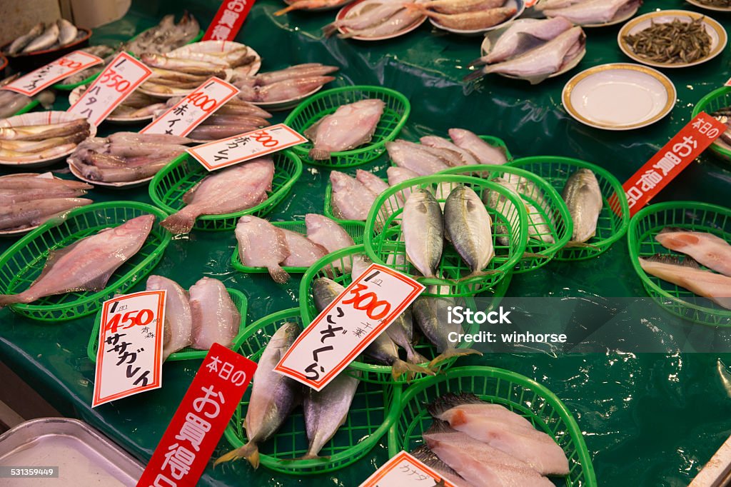 Tsukiji Fish Market in Japan Seafood at the Tsukiji Fish Market, it is the biggest wholesale fish and seafood market in the world.  Arrangement Stock Photo