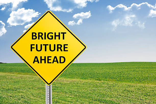 istock Bright Future Ahead Yellow Road Sign 531359881