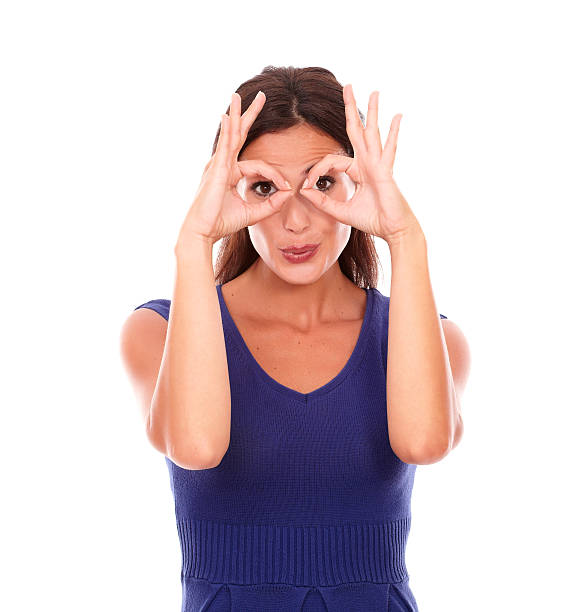 istock Cheerful girl gesturing a funny face with glasses 531359971