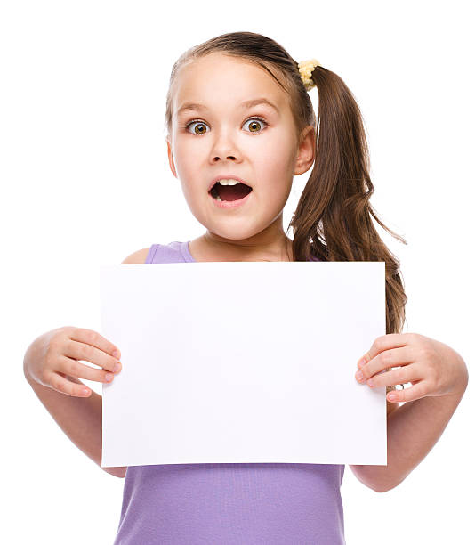 istock Girl is holding blank banner 531362337