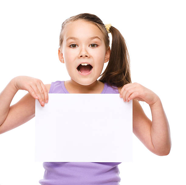 istock Girl is holding blank banner 531362345
