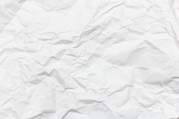 white crumpled paper background texture stock photo