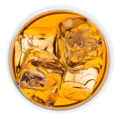 Looking down on whisky on the rocks, isolated on white. The glass is circular and tapers in gently towards the top, as preferred by serious whisky drinkers. AdobeRGB colorspace.