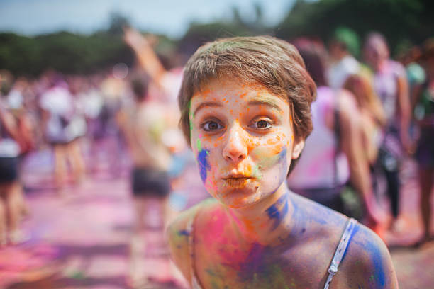 Girl have fun on Holi festival 