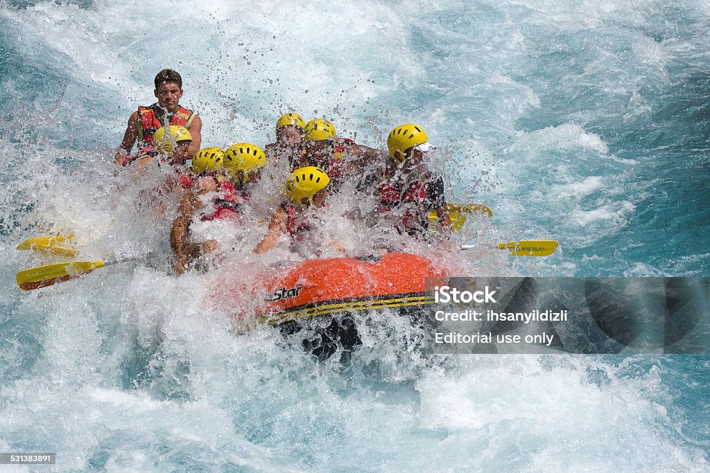 Rafting on White Water Antalya, Turkey - August 7, 2011:  - August 07, 2011: A group of people rafting on Koprucay River that is one of the most popular place for rafting in Turkey.Koprucay River runs to the Mediterranean Sea through straight canyons of Tourus Mountains. Teamwork Stock Photo