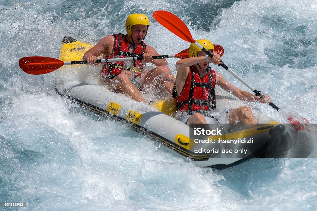 Rafting on White Water Antalya,Turkey - August 7, 2011: -August 7,2011:Two people rafting on Koprucay River that is one of the most important place for rafting in Turkey.Koprucay River runs to the Mediterranean Sea through straight canyons of Tourus Mountains. 2015 Stock Photo