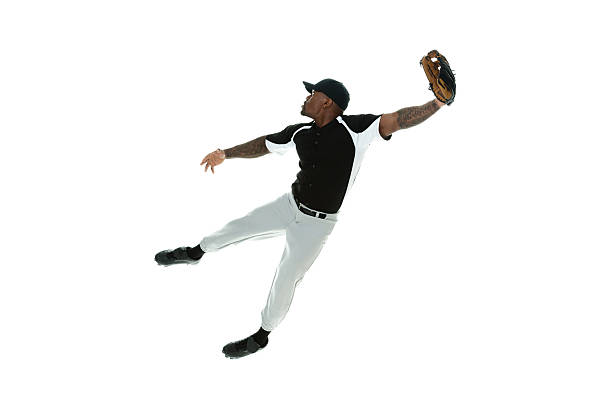 istock Baseball player jumping & catching the ball 531384011