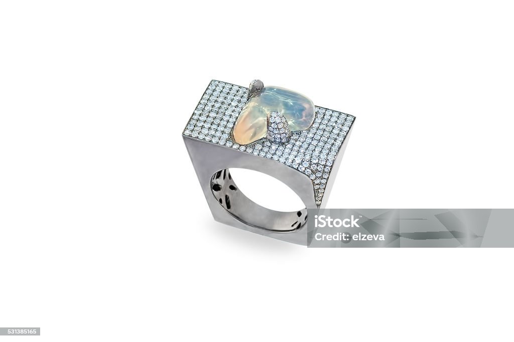 golden ring with opal and diamonds Jewelry on a white 2015 Stock Photo