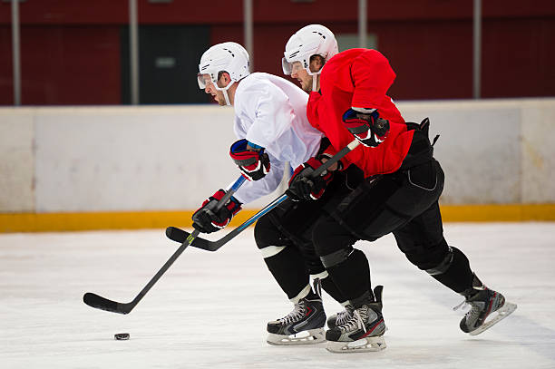 istock Two Ice Hockey Players Duelling 531385693