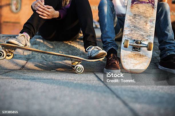 Young Skater Relaxing Stock Photo - Download Image Now - Skateboarding, Skateboard, Close-up