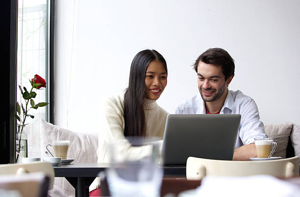 istock Young man and woman working on laptop 531387335