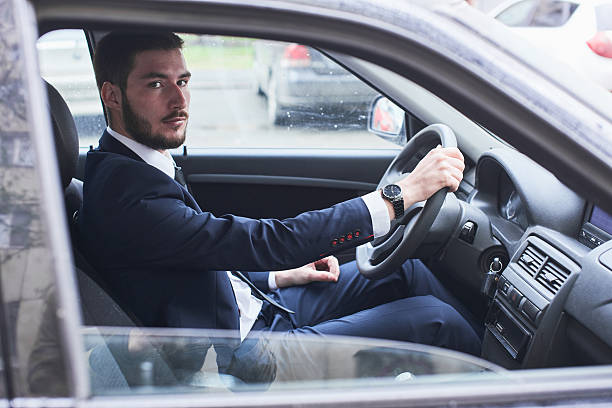 istock Businessman driving a car 531394960