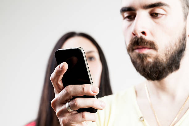 istock woman disappointed about his man on his mobile 531396584