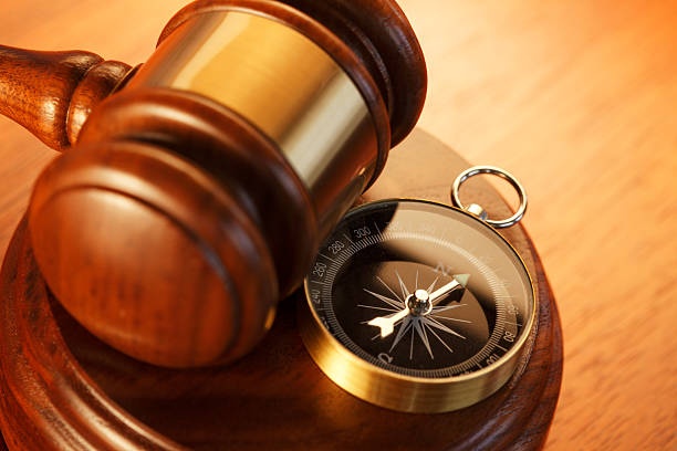 istock Compass and gavel on sound block 531397397