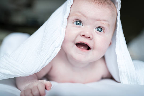 istock Beautiful Baby Under White Blanket 531399372