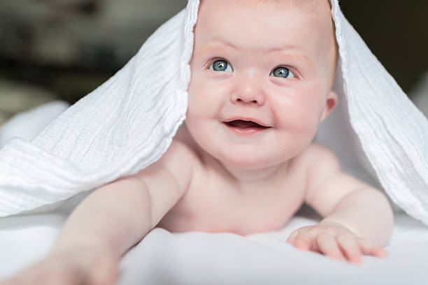 istock Beautiful Baby Under White Blanket 531399446