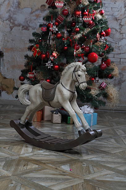 istock Interior with a Christmas tree and a horse 531399509