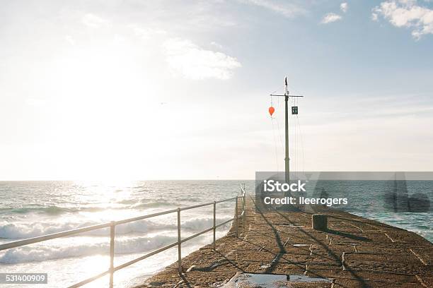 Porthleven Pier And Mast On The South Coast Of Cornwall Stock Photo - Download Image Now