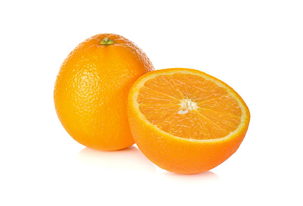 whole and cut ripe orange on white background whole and cut ripe orange on white background navel orange photos stock pictures, royalty-free photos & images