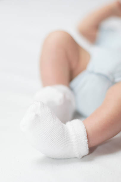 istock Newborn baby feet 531402783