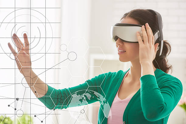 istock woman in virtual reality glasses. 531403690