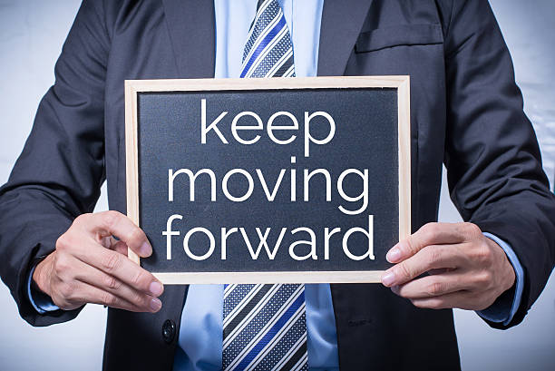istock businessman holding a black billboard 531403921