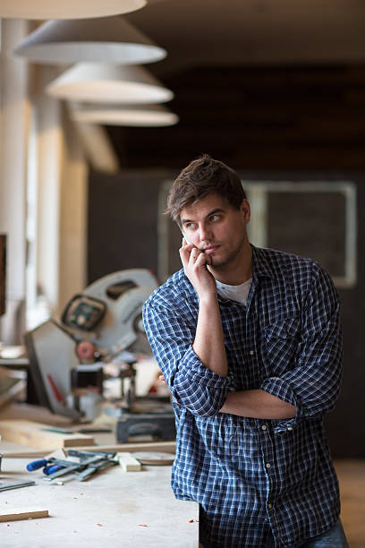 istock Portrait of senior carpenter working at his workshop while stay 531406388