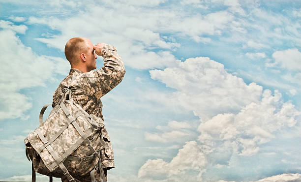 istock Rear view of soldier saluting 531409038