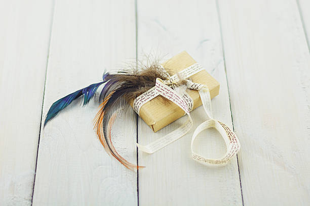 istock Small box wrapped in wrapping paper tied with a ribbon. 531410816