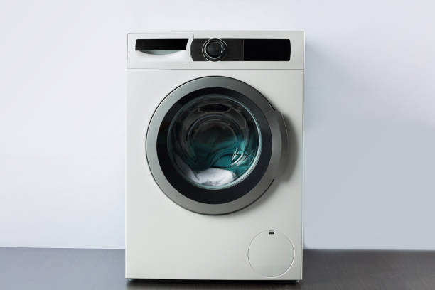 istock colorful clothes in washing machine 531411520