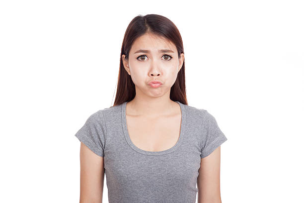 istock Young Asian woman is in bad mood 531412657