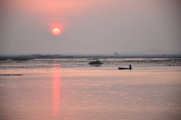 istock Sunset in lake,Thailand 531412927