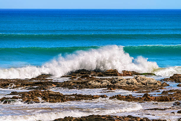 istock Waves crashing onto the coastal rocks 531413445