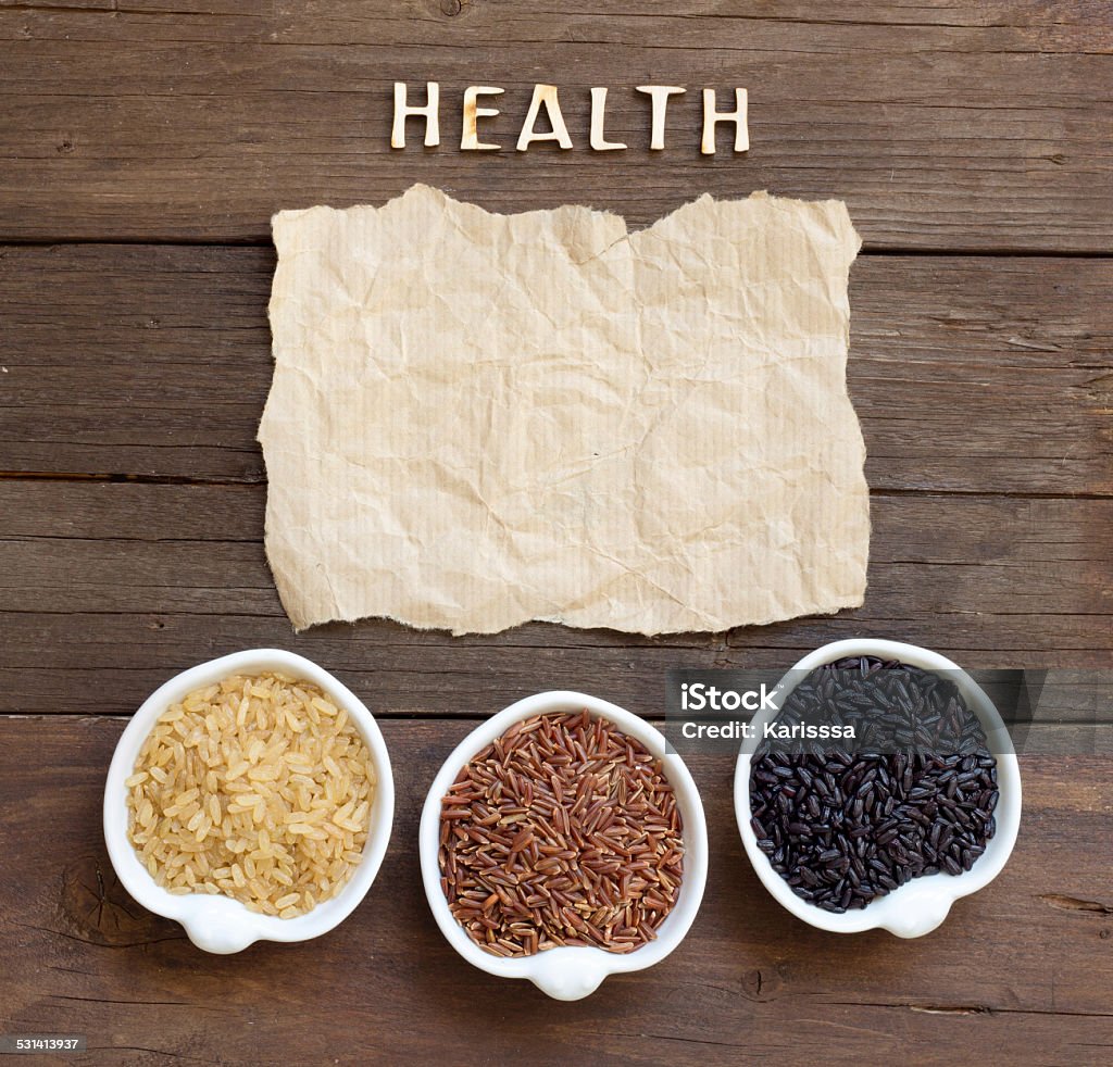 Variety of rice with craft paper and word Health Variety of rice with craft paper and word  Health 2015 Stock Photo