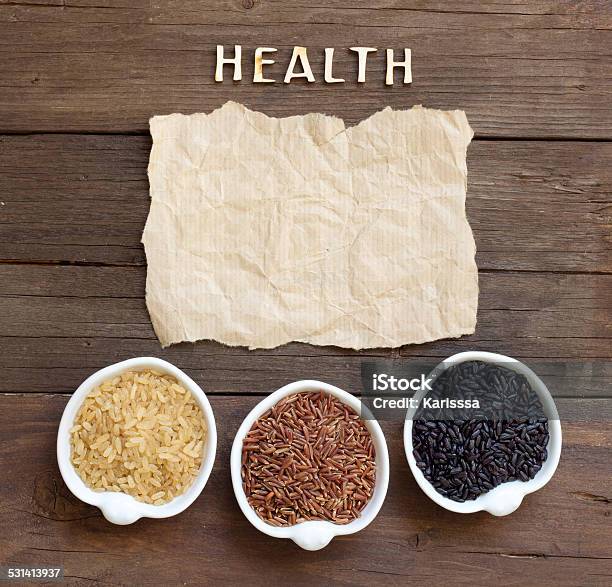 Variety Of Rice With Craft Paper And Word Health Stock Photo - Download Image Now - 2015, Black Color, Border - Frame