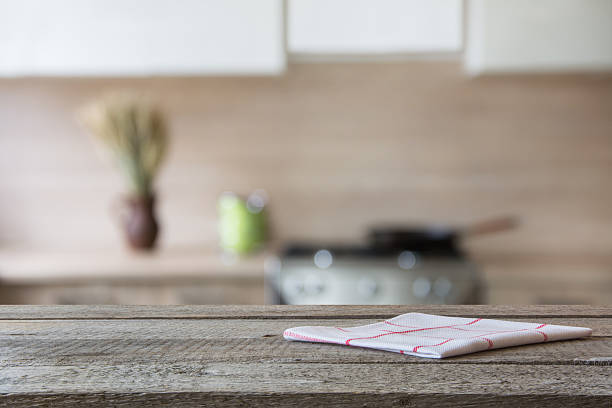 istock Blurred background. Modern kitchen with tabletop and space for you. 531414004