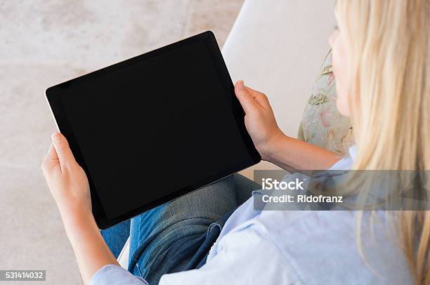 Woman Working On Tablet Stock Photo - Download Image Now - Digital Tablet, Watching, Computer Monitor