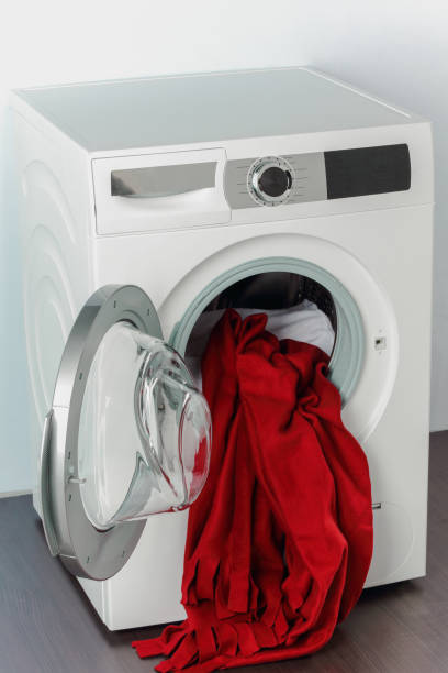 istock colorful clothes in washing machine 531414246