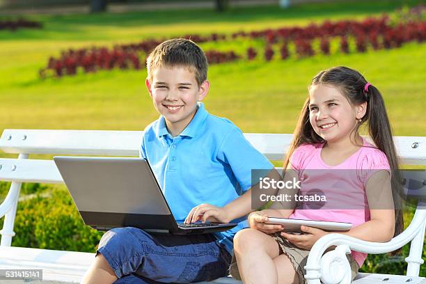 Happy Family Using Laptop Tablet Pc Stock Photo - Download Image Now - 2015, Beautiful People, Beauty