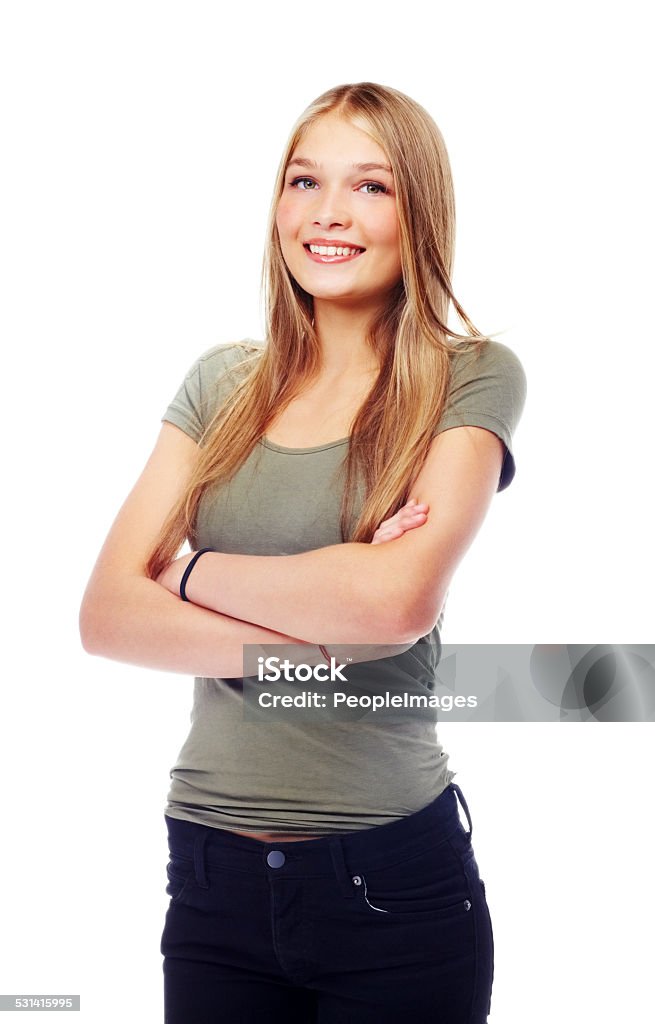 Sweet and approachable A gorgeous teenage girl standing with her arms crossed Beauty Product Stock Photo