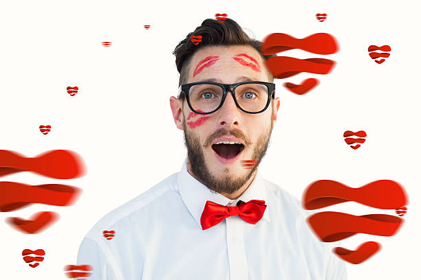 istock Composite image of geeky hipster with kisses on his face 531418575