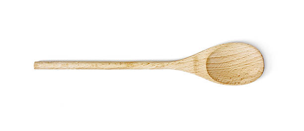 One wooden spoon on the white background stock photo
