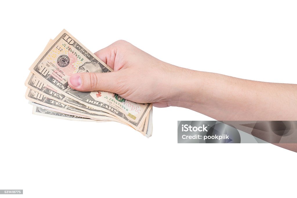 hand with stack of dollars isolated on white hand with stack of dollars isolated on white. 2015 Stock Photo