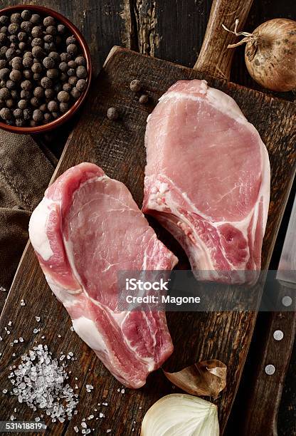 Fresh Raw Meat On Wooden Cutting Board Stock Photo - Download Image Now - 2015, Animal Bone, Bowl