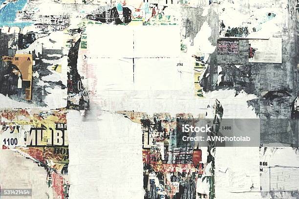 Old Urban Street Billboard With Torn Posters And Stickers Stock Photo - Download Image Now