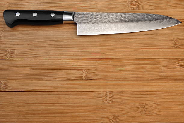 istock Japanese Professional Kitchen Knife On The Bamboo Cutting Board 531421710