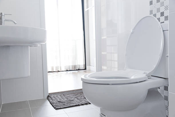 White toilet in home White toilet with water closet look outside Toilet stock pictures, royalty-free photos & images